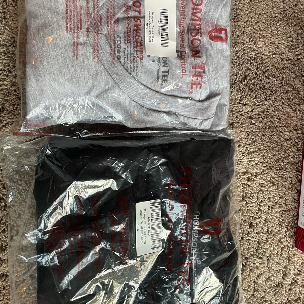 2 Thompson Tees brand new!